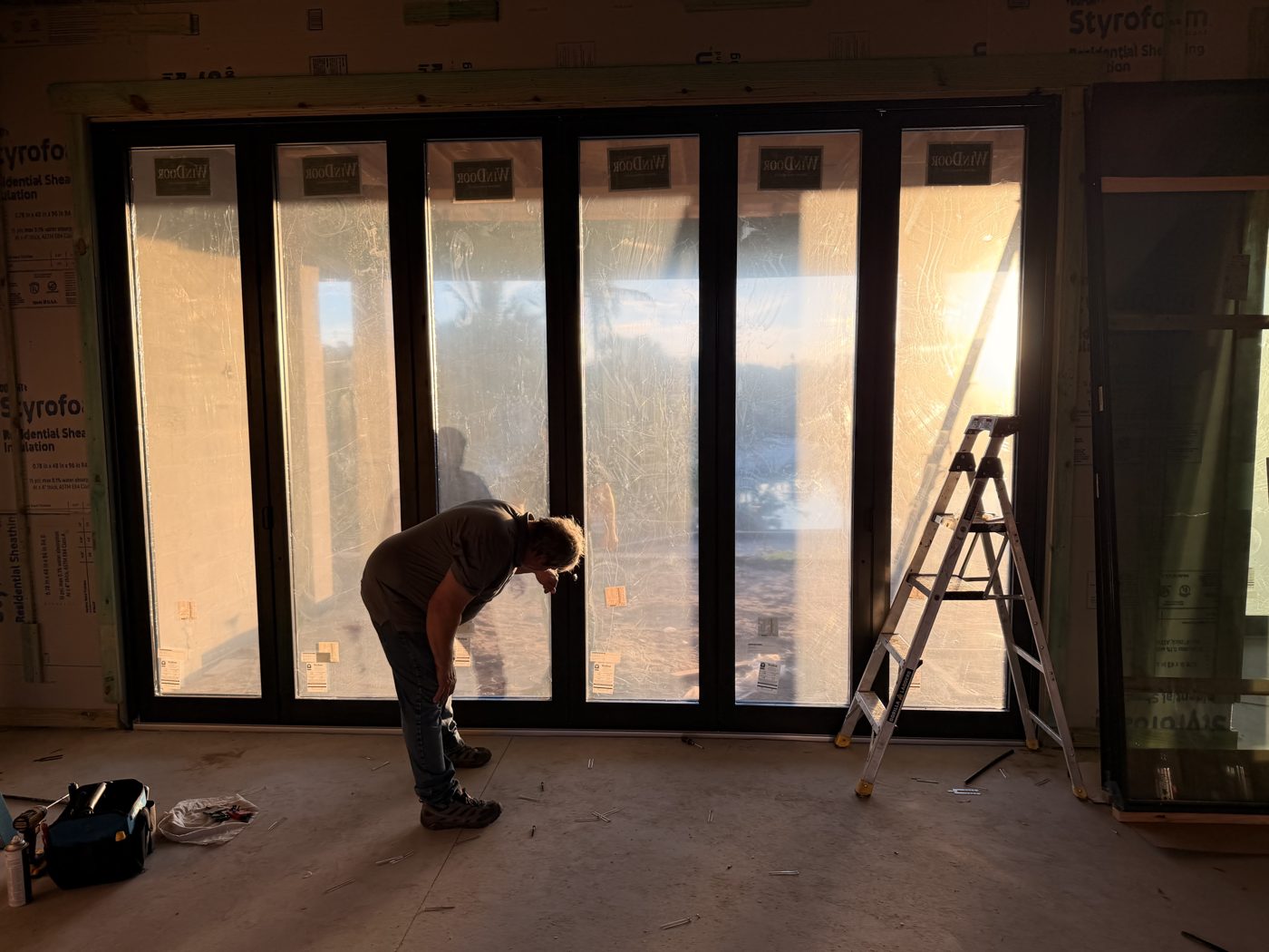 Large sliding door being installed